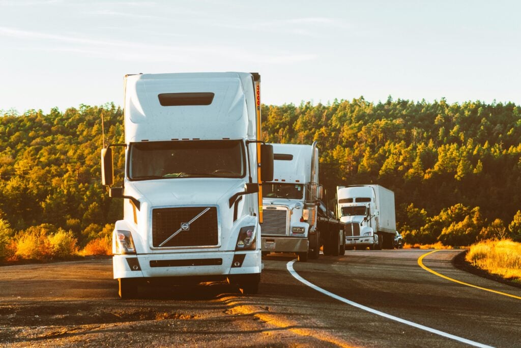 White Volvo Semi Truck On Side Of Road